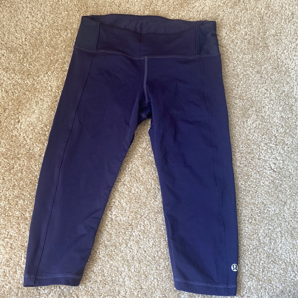 Purple lululemon above the knee legging